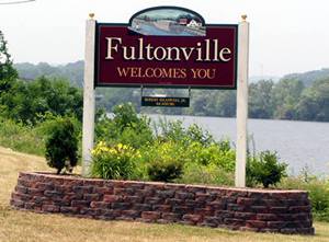Fultonville Village Sign on Riverside Drive with the Mohawk River, or Barge Canal Behind